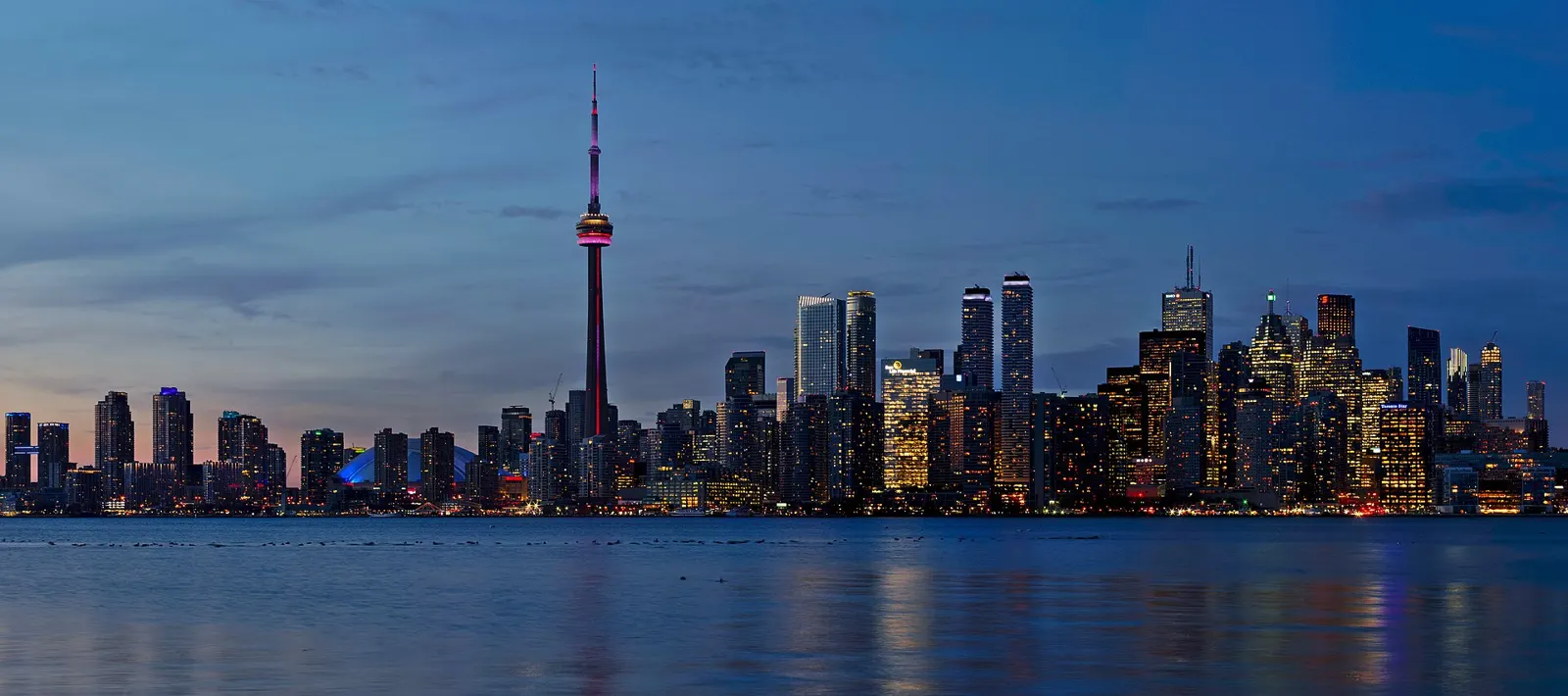Toronto skyline and CN Tower at dusk